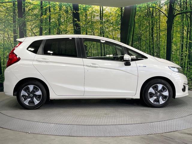 フィットハイブリッド F 禁煙車 純正8型SDナビ バックカメラ 衝突被害軽減システム レーダークルーズ ドラレコ スマートキー ビルトインETC 車線逸脱警報 オートエアコン Bluetooth CD DVD フルセグTV(66枚目)