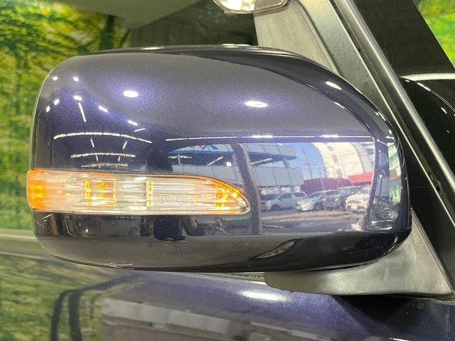 タント カスタムＸリミテッド　禁煙車　電動スライドドア　ポータブルナビ　スマートキー　ＨＩＤヘッドライト　ＥＴＣ　純正１５インチアルミホイール　オートエアコン　ＨＩＤフォグライト　革巻きステアリングホイール（26枚目）