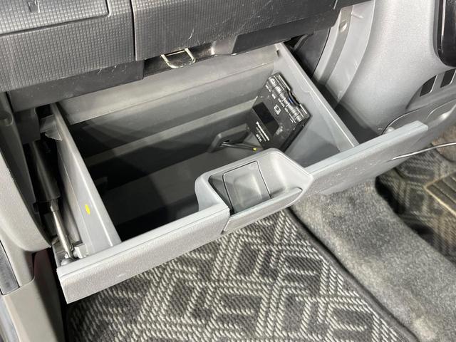 タント カスタムＸリミテッド　禁煙車　電動スライドドア　ポータブルナビ　スマートキー　ＨＩＤヘッドライト　ＥＴＣ　純正１５インチアルミホイール　オートエアコン　ＨＩＤフォグライト　革巻きステアリングホイール（34枚目）