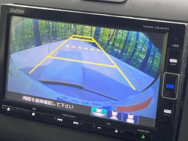 フリードハイブリッド ハイブリッド・Gホンダセンシング 禁煙車 両側電動ドア 純正SDナビ バックカメラ 衝突被害軽減システム レーダークルーズ ドラレコ スマートキー LEDヘッド ビルトインETC 純正15インチアルミ 車線逸脱警報 オートライト(5枚目)