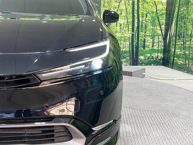 プリウス Ｚ　禁煙車　モデリスタフルエアロ　純正１２型ＤＡ　全周囲カメラ　ＢＳＭ　アドバンスパーク　レーダークルーズ　電動リアゲート　前席シートエアコン　パワーシート　ドラレコ　コーナーセンサー　ＥＴＣ２．０（12枚目）