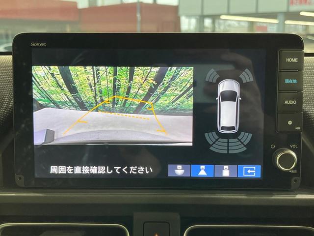 フリード ｅ：ＨＥＶエアー　ＥＸ　登録済未使用車　純正９型ナビ　両側電動ドア　バックカメラ　衝突被害軽減システム　レーダークルーズ　コーナーセンサー　シートヒーター　ＬＥＤヘッドライト　純正１５インチアルミ　Ａｐｐｌｅｃａｒｐｌａｙ（4枚目）