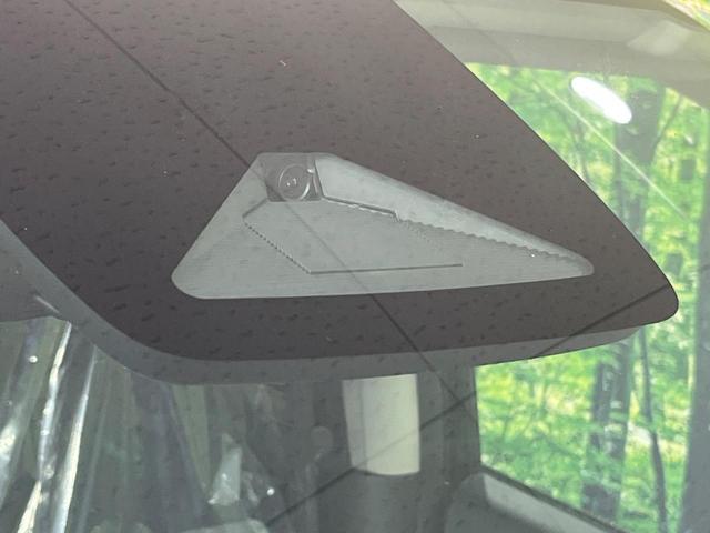 フリード ｅ：ＨＥＶエアー　ＥＸ　登録済未使用車　純正９型ナビ　両側電動ドア　バックカメラ　衝突被害軽減システム　レーダークルーズ　コーナーセンサー　シートヒーター　ＬＥＤヘッドライト　純正１５インチアルミ　Ａｐｐｌｅｃａｒｐｌａｙ（5枚目）