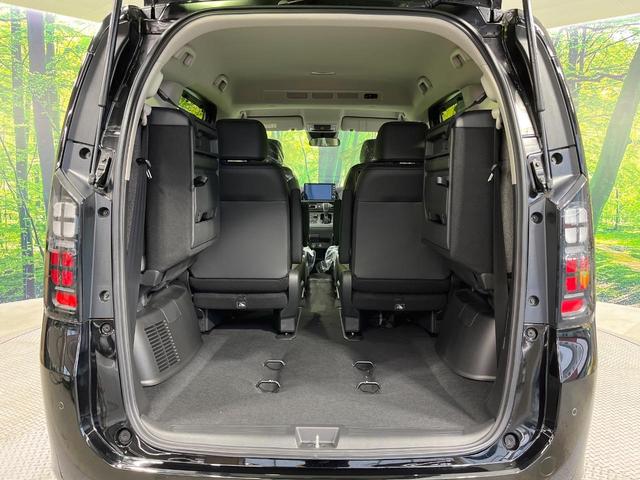 フリード ｅ：ＨＥＶエアー　ＥＸ　登録済未使用車　純正９型ナビ　両側電動ドア　バックカメラ　衝突被害軽減システム　レーダークルーズ　コーナーセンサー　シートヒーター　ＬＥＤヘッドライト　純正１５インチアルミ　Ａｐｐｌｅｃａｒｐｌａｙ（11枚目）