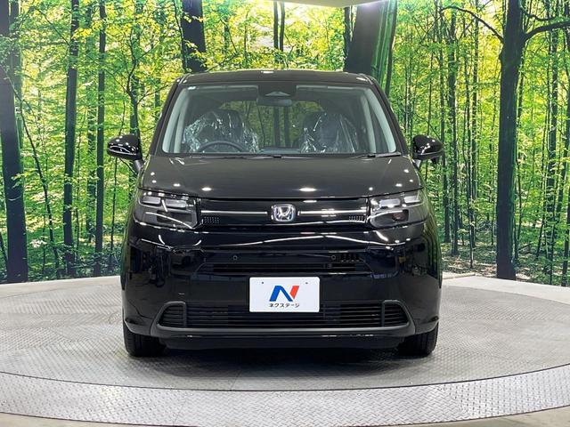 フリード ｅ：ＨＥＶエアー　ＥＸ　登録済未使用車　純正９型ナビ　両側電動ドア　バックカメラ　衝突被害軽減システム　レーダークルーズ　コーナーセンサー　シートヒーター　ＬＥＤヘッドライト　純正１５インチアルミ　Ａｐｐｌｅｃａｒｐｌａｙ（15枚目）