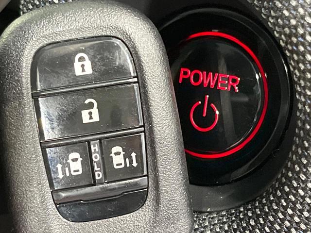 フリード ｅ：ＨＥＶエアー　ＥＸ　登録済未使用車　純正９型ナビ　両側電動ドア　バックカメラ　衝突被害軽減システム　レーダークルーズ　コーナーセンサー　シートヒーター　ＬＥＤヘッドライト　純正１５インチアルミ　Ａｐｐｌｅｃａｒｐｌａｙ（25枚目）