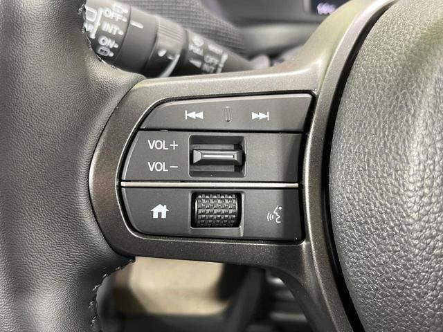 フリード ｅ：ＨＥＶエアー　ＥＸ　登録済未使用車　純正９型ナビ　両側電動ドア　バックカメラ　衝突被害軽減システム　レーダークルーズ　コーナーセンサー　シートヒーター　ＬＥＤヘッドライト　純正１５インチアルミ　Ａｐｐｌｅｃａｒｐｌａｙ（50枚目）