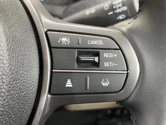 フリード ｅ：ＨＥＶエアー　ＥＸ　登録済未使用車　純正９型ナビ　両側電動ドア　バックカメラ　衝突被害軽減システム　レーダークルーズ　コーナーセンサー　シートヒーター　ＬＥＤヘッドライト　純正１５インチアルミ　Ａｐｐｌｅｃａｒｐｌａｙ（51枚目）