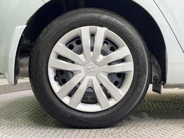 フィット ｅ：ＨＥＶホーム　禁煙車　純正９型ＳＤナビ　バックカメラ　衝突被害軽減システム　レーダークルーズ　ドラレコ　コーナーセンサー　スマートキー　ＬＥＤヘッド　ビルトインＥＴＣ　車線逸脱警報　オートライト　オートエアコン（28枚目）