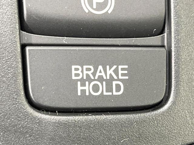 フィット ｅ：ＨＥＶホーム　禁煙車　純正９型ＳＤナビ　バックカメラ　衝突被害軽減システム　レーダークルーズ　ドラレコ　コーナーセンサー　スマートキー　ＬＥＤヘッド　ビルトインＥＴＣ　車線逸脱警報　オートライト　オートエアコン（36枚目）