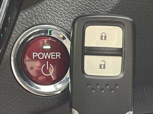 ヴェゼル ハイブリッドZ 禁煙車 純正8型ナビ バックカメラ 衝突被害軽減システム ドラレコ スマートキー LEDヘッド シートヒーター ETC クルコン オートライト デュアルエアコン Bluetooth CD DVD再生(24枚目)