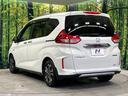 ハイブリッド・クロスターホンダセンシング　禁煙車　純正９型ナビ　両側電動ドア　レーダークルーズ　合皮コンビシート　ＬＥＤヘッドライト　ＥＴＣ　ドラレコ　シートヒーター　バックカメラ　フルセグＴＶ　Ｂｌｕｅｔｏｏｔｈ再生(23枚目)