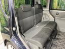 カスタムＸリミテッド　禁煙車　電動スライドドア　ポータブルナビ　スマートキー　ＨＩＤヘッドライト　ＥＴＣ　純正１５インチアルミホイール　オートエアコン　ＨＩＤフォグライト　革巻きステアリングホイール（9枚目）