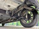 カスタムＸリミテッド　禁煙車　電動スライドドア　ポータブルナビ　スマートキー　ＨＩＤヘッドライト　ＥＴＣ　純正１５インチアルミホイール　オートエアコン　ＨＩＤフォグライト　革巻きステアリングホイール（20枚目）
