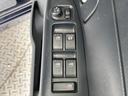 カスタムＸリミテッド　禁煙車　電動スライドドア　ポータブルナビ　スマートキー　ＨＩＤヘッドライト　ＥＴＣ　純正１５インチアルミホイール　オートエアコン　ＨＩＤフォグライト　革巻きステアリングホイール（23枚目）