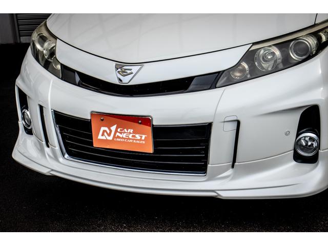 エスティマ アエラス　Ｒカメラ　禁煙　イモビライザー　地デジＴＶ　Ｓキー　Ｂｌｕｅｔｏｏｔｈ音楽　ナビＴＶ　デュアルエアバック　エアロ　オットマン　エアコン　ＰＳ　クルコン　Ｗエアコン　ＨＤＤナビ　ＥＴＣ　３列　ＡＢＳ（9枚目）