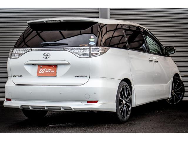 エスティマ アエラス　Ｒカメラ　禁煙　イモビライザー　地デジＴＶ　Ｓキー　Ｂｌｕｅｔｏｏｔｈ音楽　ナビＴＶ　デュアルエアバック　エアロ　オットマン　エアコン　ＰＳ　クルコン　Ｗエアコン　ＨＤＤナビ　ＥＴＣ　３列　ＡＢＳ（10枚目）