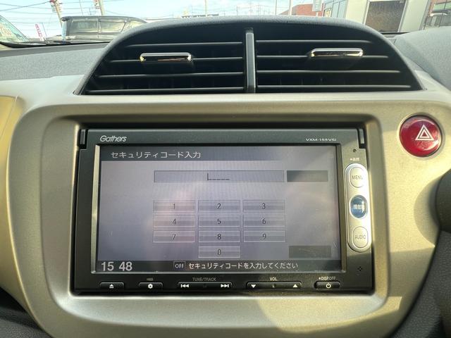 フィットハイブリッド スマートセレクション　ハイブリッド　盗難防止システム　アイドリングストップ　キーレスエントリー　フルフラットシート　電動ミラー　イモビライザー　アイドルストップ　スマートキー　ＥＴＣ　キーフリー（31枚目）