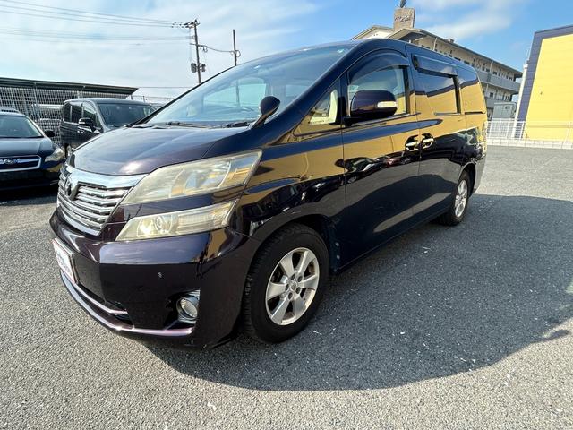 ヴェルファイア ２．４Ｘ　フルフラットシート　デュアルエアコン　Ｂカメ　サイドエアバック　盗難防止　スマートキープッシュスタート　ＥＳＣ　Ｗエアバッグ　ＡＢＳ　キーレス　３列シ－ト　ミュージックプレイヤー接続可（7枚目）