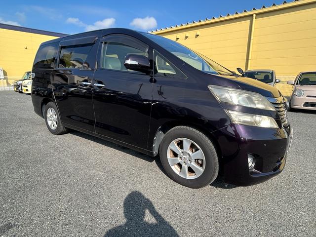 ヴェルファイア ２．４Ｘ　フルフラットシート　デュアルエアコン　Ｂカメ　サイドエアバック　盗難防止　スマートキープッシュスタート　ＥＳＣ　Ｗエアバッグ　ＡＢＳ　キーレス　３列シ－ト　ミュージックプレイヤー接続可（9枚目）