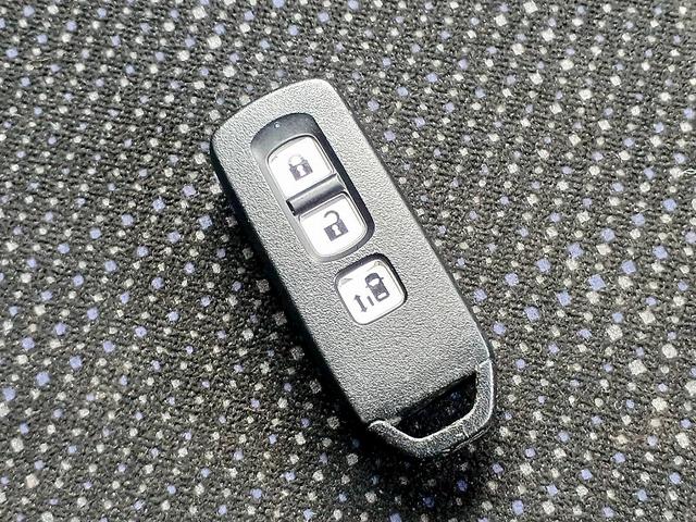 Ｎ－ＢＯＸ Ｇ・Ｌパッケージ　後期　社外ナビ　フルセグ／ＤＶＤ／ＢＴ　Ｂカメラ　電スラ　ＥＴＣ　スマートキー　Ｐスタート　電格ミラー　シートリフター　Ｐガラス　ウィンカーミラー　ＥＣＯＮ　横滑り防止　バイザー　リアワイパー（26枚目）