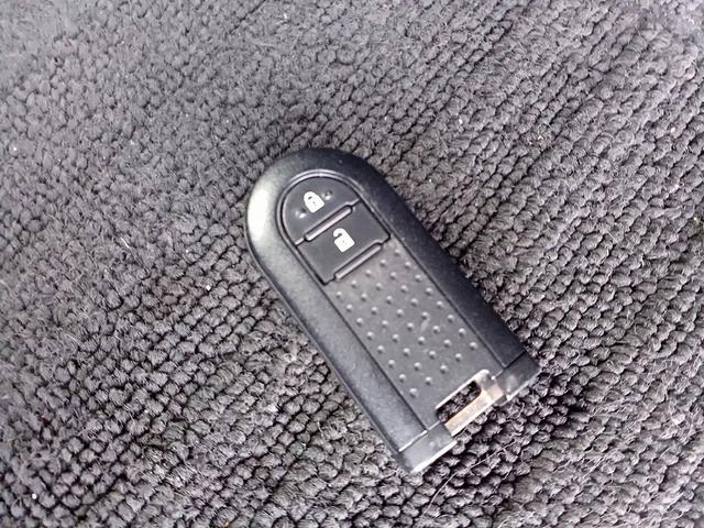 ムーヴキャンバス Xメイクアップ SAII ナビ 地デジ/DVD/BT Bカメラ ETC Aライト フォグ スマアシ2 ステリモ 電格ミラー スマートキー Pスタート Pガラス Aストップ シートリフター ベンチシート アームレスト 横滑り防止(27枚目)