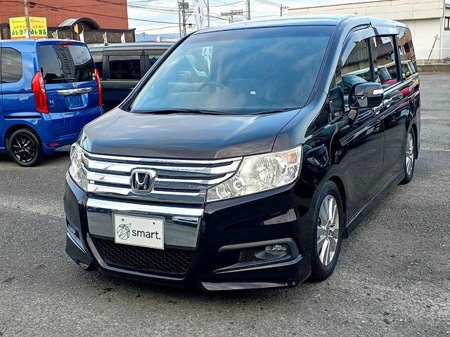 ステップワゴンスパーダ Ｚ　ナビ　フルセグ　ＤＶＤ　ＢＴ　Ｂカメラ　両電ドア　フリップダウン　ＨＩＤライト　フォグ　ローダウン　シートカバー　電格ミラー　シートリフター　ウィンカーミラー　ステリモ　スマートキー　ＥＴＣ（3枚目）