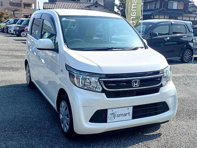 Ｎ－ＷＧＮ Ｇ　スマートキー　Ｐスタート　電格ミラー　Ｐガラス　スペアキー　マット　サイドバイザー　リアワイパー　ベンチシート　アームレスト　ヘッドライトレベライザー　横滑り防止機能　ＥＣＯＮ　チルトステアリング（5枚目）