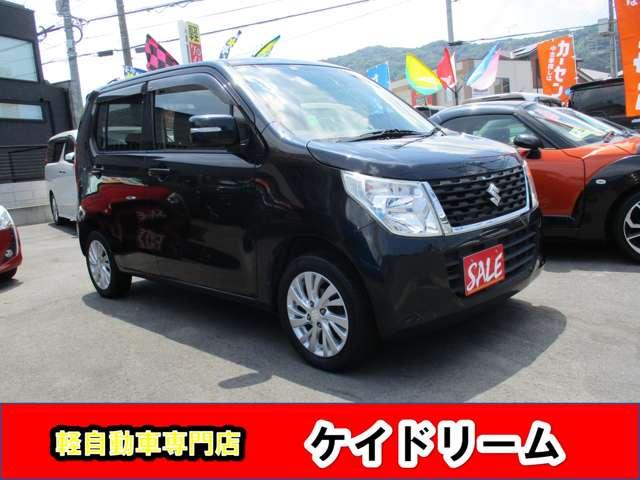 ワゴンＲ ＦＸリミテッド　ワンオーナー禁煙車プツシュスターターアイドリングストツプスマートキータイミングチエーンシートヒーターＥＴＣ純正アルミリヤスポイラー（9枚目）