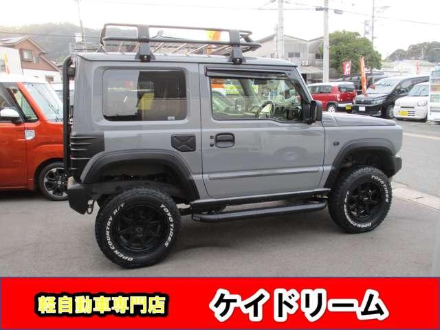 ジムニー ＸＬ　２インチリフトアツプ前後トーションバー装備社外アルミサイドステップルーフキャリアリヤラダー社外ＬＥＤライトレザーシートカバー社外コンビステアリングナビＴＶバツクカメラプツシュスタータースマートキー（4枚目）