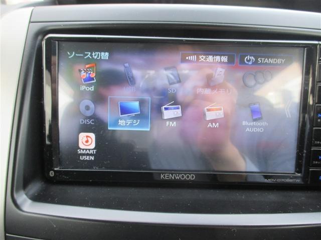 ヴォクシー Ｚ　パワーウインドウ　アルミホイル　パワーステアリング　ＥＴＣ付き　ＡＵＴＯエアコン　ＡＢＳ　三列シート　ＴＶナビ　盗難防止装置　メモリーナビ　記録簿　キーレスエントリ　スマートキープッシュスタート（12枚目）