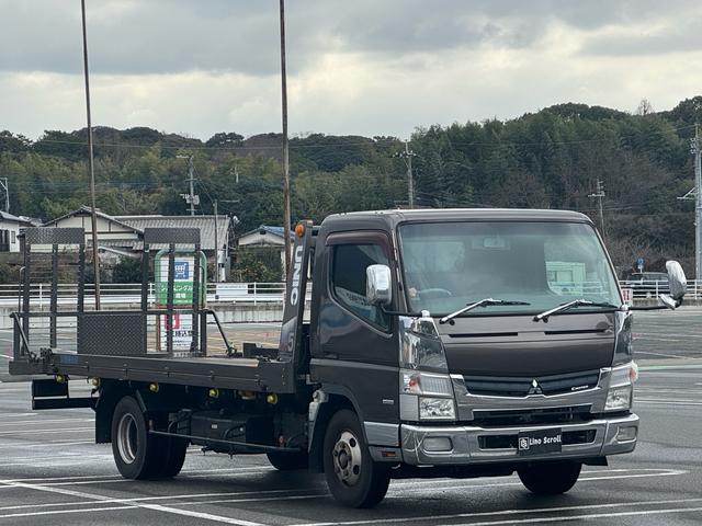 キャンター 　カスタム　積載車　キャリアカー　車輌運搬車　キャンターカスタム　ユニックネオ５　　積載量２０００キロ　メッキバンパー　左右開閉あおり　セーフティーローダー　ナビ　バックカメラ　Ｂｌｕｅｔｏｏｔｈ（3枚目）
