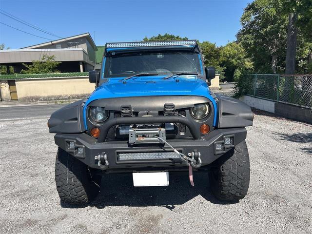 ジープ・ラングラーアンリミテッド 　４ＷＤ　ドライブレコーダー　ＥＴＣ　サイドカメラ　オートクルーズコントロール　ナビ　ＴＶ　ＡＴ　Ｂｌｕｅｔｏｏｔｈ　ＥＳＣ　エアコン　パワーウィンドウ　運転席エアバッグ　助手席エアバッグ（2枚目）