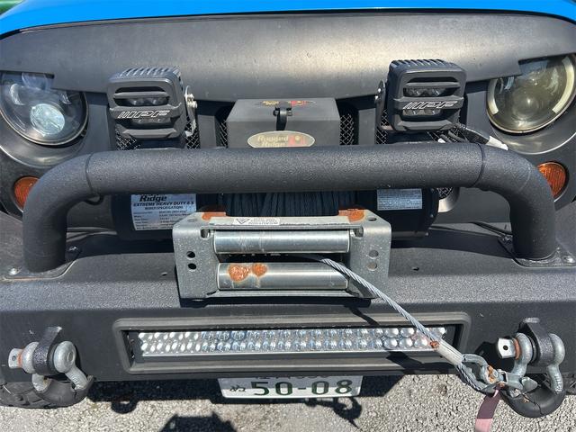 ジープ・ラングラーアンリミテッド 　４ＷＤ　ドライブレコーダー　ＥＴＣ　サイドカメラ　オートクルーズコントロール　ナビ　ＴＶ　ＡＴ　Ｂｌｕｅｔｏｏｔｈ　ＥＳＣ　エアコン　パワーウィンドウ　運転席エアバッグ　助手席エアバッグ（12枚目）
