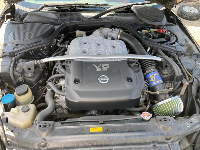 フェアレディＺ ロードスターバージョンＴ　オープンカー　ＥＴＣ　ＨＩＤ　ＡＴ　キーレスエントリー　シートヒーター　アルミホイール　盗難防止システム　衝突安全ボディ　ＡＢＳ　エアコン　パワーステアリング　パワーウィンドウ　運転席エアバッグ（18枚目）