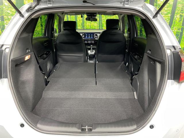 フィット ｅ：ＨＥＶホーム　禁煙車　純正９型ナビ　ホンダセンシング　アダプティブクルーズコントロール　ＬＥＤヘッドライト　バックカメラ　オートエアコン　ＥＴＣ　ドライブレコーダー　Ｂｌｕｅｔｏｏｔｈ　パーキングセンサーシステム（10枚目）