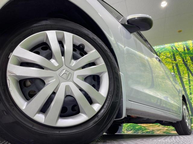 フィット ｅ：ＨＥＶホーム　禁煙車　純正９型ナビ　ホンダセンシング　アダプティブクルーズコントロール　ＬＥＤヘッドライト　バックカメラ　オートエアコン　ＥＴＣ　ドライブレコーダー　Ｂｌｕｅｔｏｏｔｈ　パーキングセンサーシステム（13枚目）