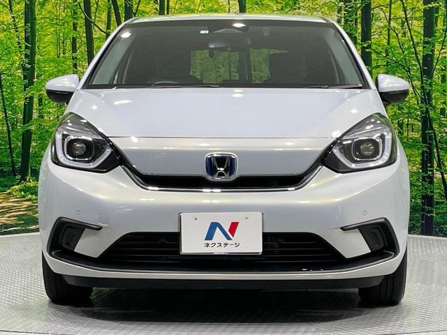フィット ｅ：ＨＥＶホーム　禁煙車　純正９型ナビ　ホンダセンシング　アダプティブクルーズコントロール　ＬＥＤヘッドライト　バックカメラ　オートエアコン　ＥＴＣ　ドライブレコーダー　Ｂｌｕｅｔｏｏｔｈ　パーキングセンサーシステム（14枚目）