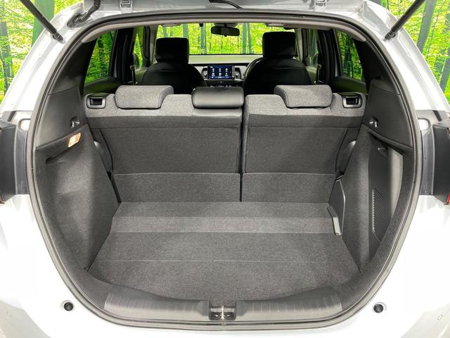 フィット ｅ：ＨＥＶホーム　禁煙車　純正９型ナビ　ホンダセンシング　アダプティブクルーズコントロール　ＬＥＤヘッドライト　バックカメラ　オートエアコン　ＥＴＣ　ドライブレコーダー　Ｂｌｕｅｔｏｏｔｈ　パーキングセンサーシステム（34枚目）