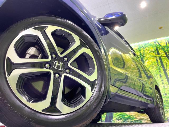 ヴェゼル ハイブリッドＺ　禁煙車　純正ナビ　シティブレーキアクティブシステム　ブラウン内装　フルセグＴＶ　バックカメラ　ＥＴＣ　ハーフレザーシート　シートヒーター　ＬＥＤヘッドライト　ルーフレール　クルーズコントロール（13枚目）