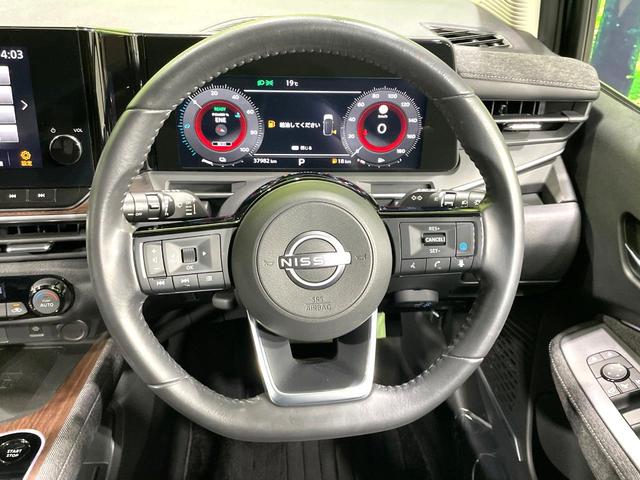 オーラ G レザーエディション 禁煙車 純正9型ナビ BOSE エマージェンシーブレーキ プロパイロット 全周囲カメラ ブラック本革シート スマートキー アダプティブLEDヘッドライト LEDフォグライト AppleCarPlay(11枚目)
