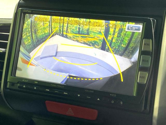 N-BOXカスタム G・Lパッケージ 禁煙車 純正ナビ バックカメラ フルセグTV ETC 電動スライドドア HIDヘッドライト オートライト オートエアコン 純正14インチAW フロントフォグランプ 電動格納ミラー スマートキー(4枚目)