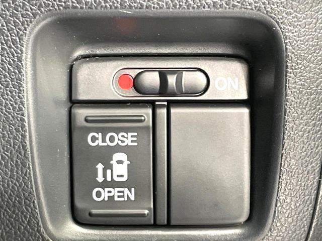 N-BOXカスタム G・Lパッケージ 禁煙車 純正ナビ バックカメラ フルセグTV ETC 電動スライドドア HIDヘッドライト オートライト オートエアコン 純正14インチAW フロントフォグランプ 電動格納ミラー スマートキー(5枚目)