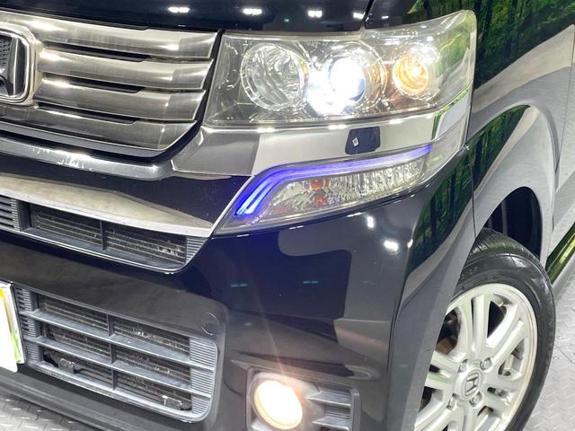 N-BOXカスタム G・Lパッケージ 禁煙車 純正ナビ バックカメラ フルセグTV ETC 電動スライドドア HIDヘッドライト オートライト オートエアコン 純正14インチAW フロントフォグランプ 電動格納ミラー スマートキー(12枚目)