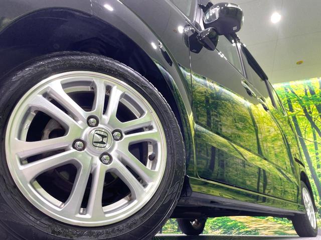 N-BOXカスタム G・Lパッケージ 禁煙車 純正ナビ バックカメラ フルセグTV ETC 電動スライドドア HIDヘッドライト オートライト オートエアコン 純正14インチAW フロントフォグランプ 電動格納ミラー スマートキー(13枚目)