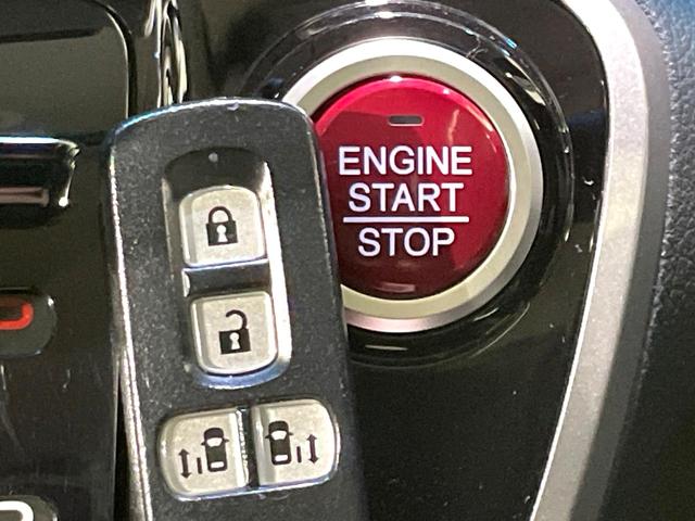 N-BOX G SSパッケージ 禁煙車 パイオニアナビ 両側電動スライド シティブレーキアクティブシステム 純正14インチアルミホイール オートエアコン スマートキー CD再生 電動格納ミラー アイドリングストップ 盗難防止システム(6枚目)