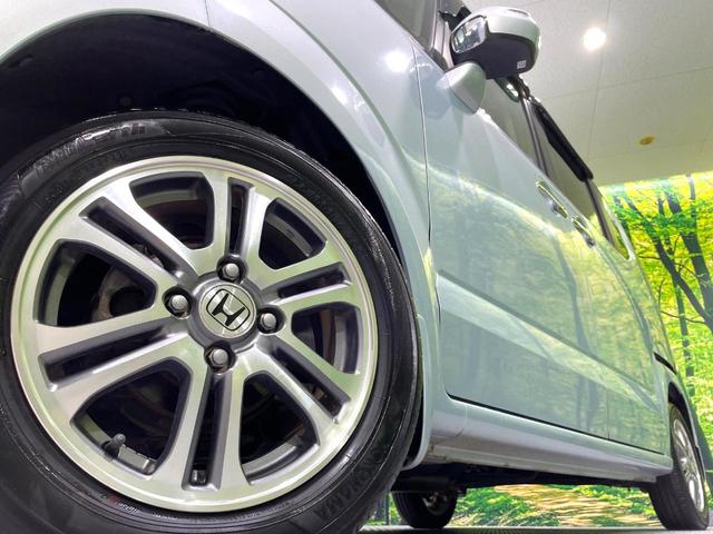 N-BOX G SSパッケージ 禁煙車 パイオニアナビ 両側電動スライド シティブレーキアクティブシステム 純正14インチアルミホイール オートエアコン スマートキー CD再生 電動格納ミラー アイドリングストップ 盗難防止システム(13枚目)