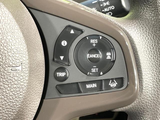 N-BOX G・Lホンダセンシング 禁煙車 純正ナビ バックカメラ 電動スライドドア アダプティブクルーズ LEDヘッドライト オートマチックハイビーム Bluetooth接続 ETC CD/DVD再生 オートエアコン スマートキー(7枚目)