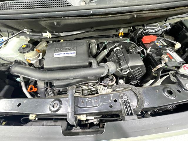 N-BOX G・Lホンダセンシング 禁煙車 純正ナビ バックカメラ 電動スライドドア アダプティブクルーズ LEDヘッドライト オートマチックハイビーム Bluetooth接続 ETC CD/DVD再生 オートエアコン スマートキー(18枚目)