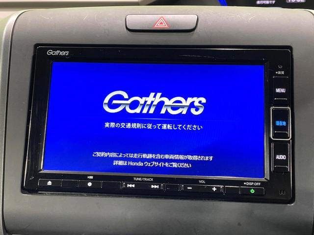 フリードハイブリッド ハイブリッド・Gホンダセンシング 禁煙車 両側電動スライドドア 純正ナビ ホンダセンシング アダプティブクルーズ フルセグTV バックカメラ シートヒーター ETC ドラレコ Bluetooth接続 LEDヘッド オートエアコン(3枚目)